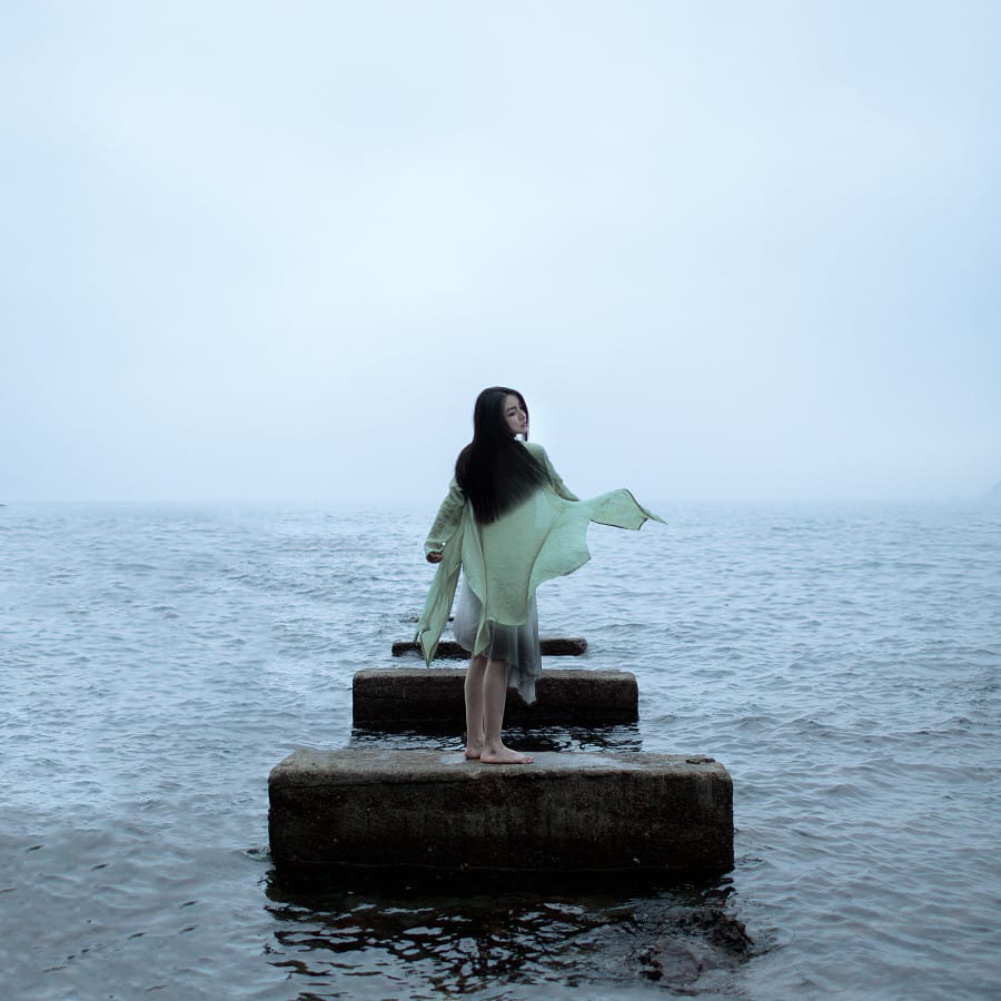 Full Length Figure on Coastal Steps