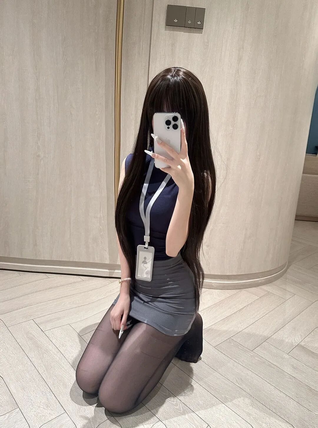 Close up mirror selfie of office aesthetic outfit with long dark hair